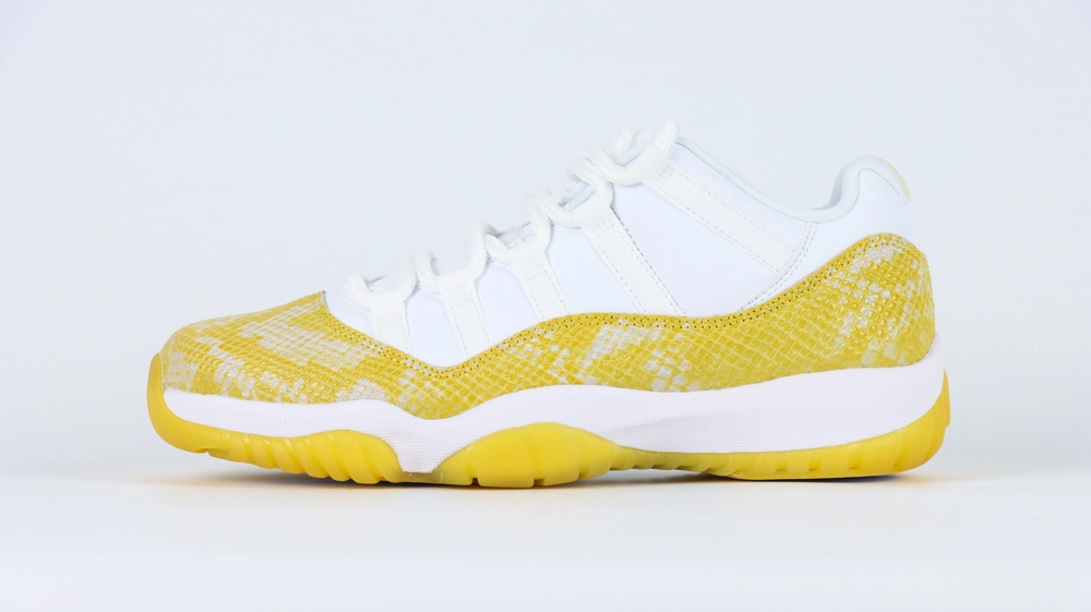 jordan 11 retro low yellow snakeskin (women’s)