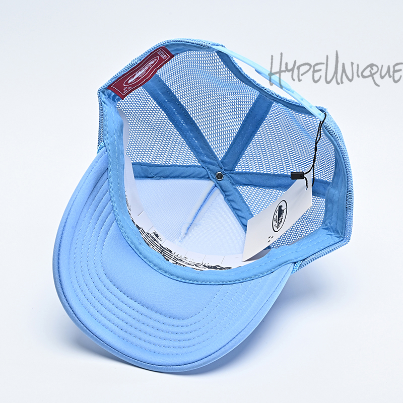 corteiz alcatraz trucker hat baby blue