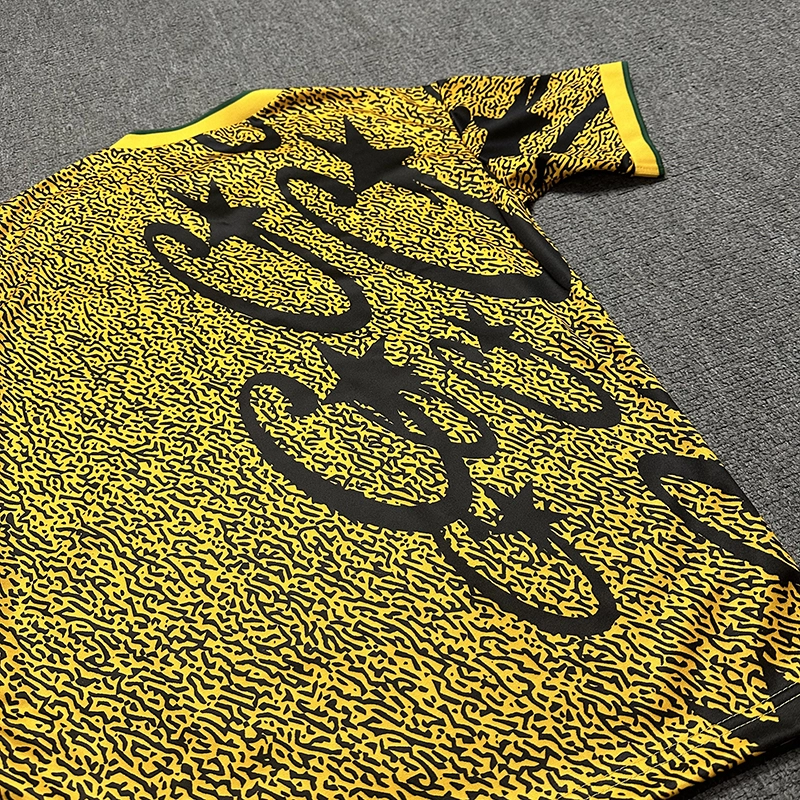 corteiz carni stellations football jersey ‘yellow’ reps